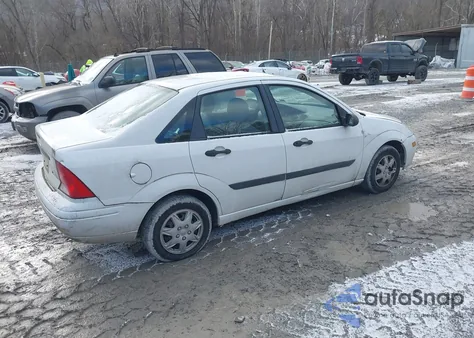 2004 Ford Focus Lx z USA, uszkodzony, nr VIN 1FAFP33P44W195187